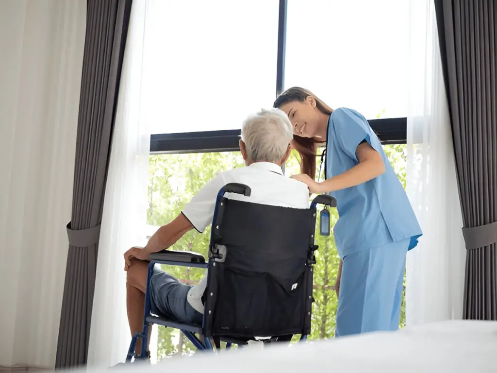 Nurse tending to patient.