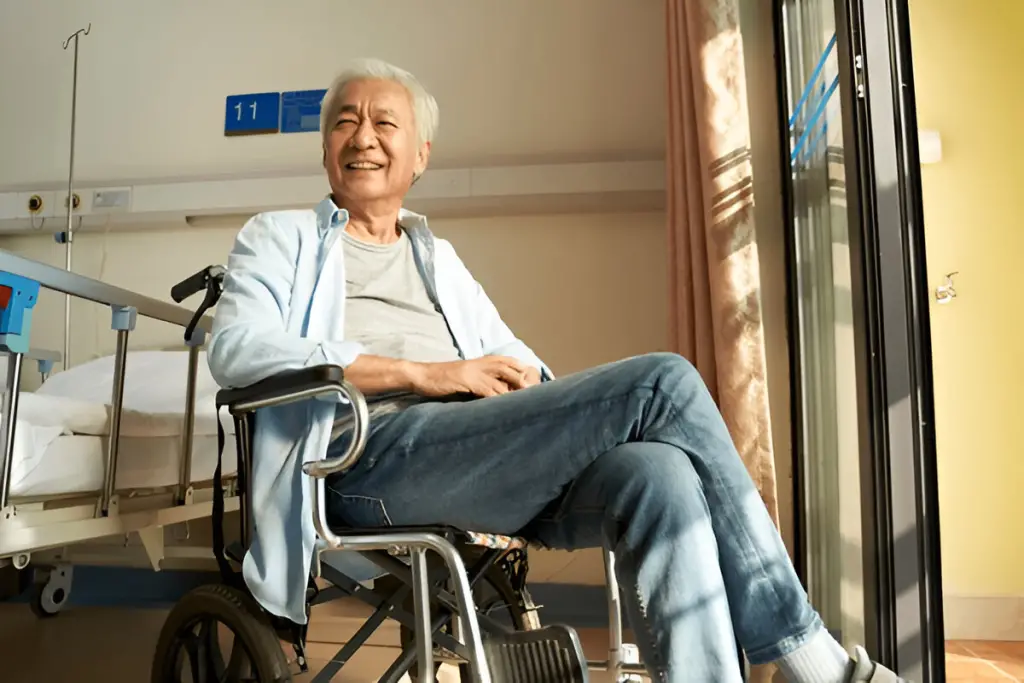 Happy man in a wheelchair.