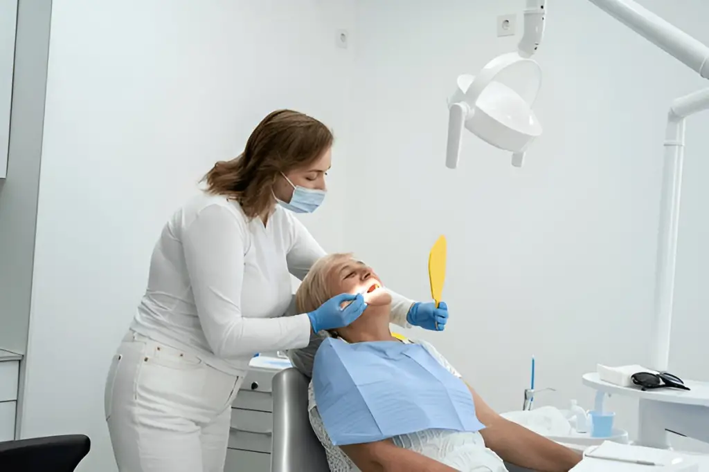 A dentist examining a patient.
