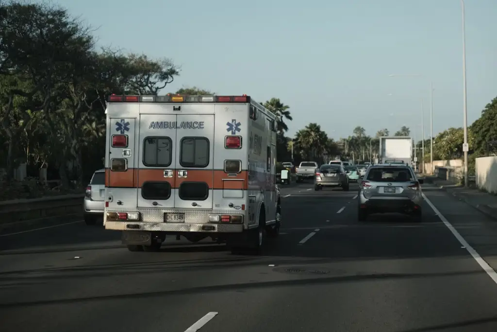 Ambulance on busy highway - Medicaid for Non-Emergency Medical Transportation