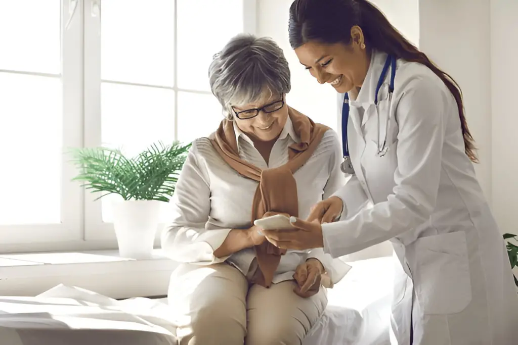 Doctor showing patient smartphone app.