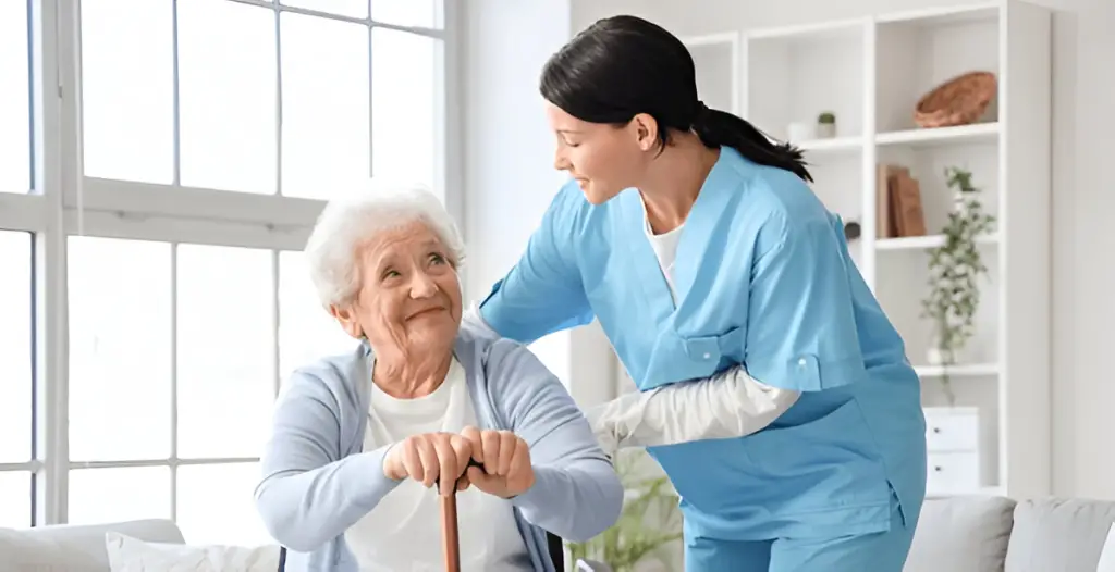 Nurse assisting older woman indoors.