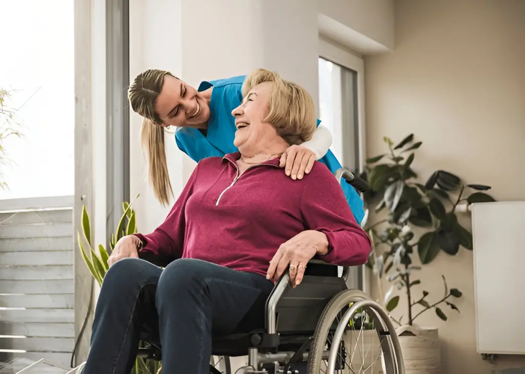 Caregiver and woman in wheelchair.