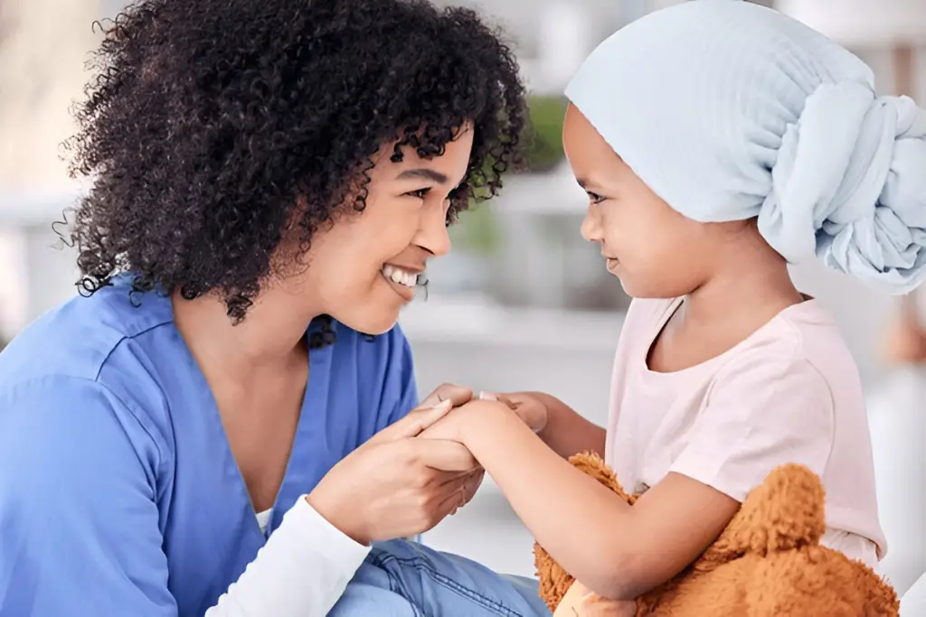 Nurse holding child's hands.